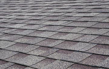 Uploders tiles for shallow pitch roofing
